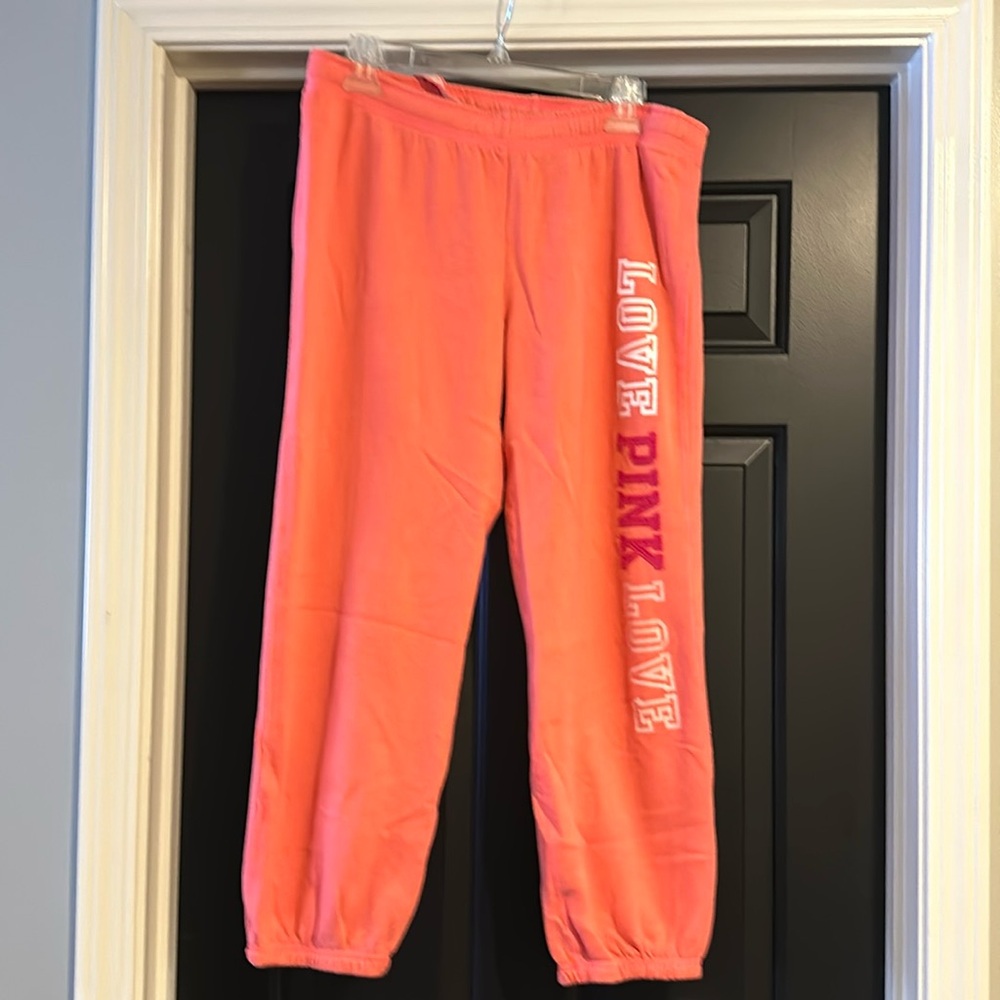 Pink medium coral joggers with functional drawstring.Matching sweatshirt listed